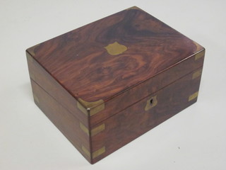 A walnut and brass banded writing slope with hinged lid 12"