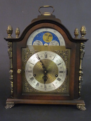 A reproduction Georgian bracket clock with gilt dial, silvered  chapter ring and phases of the moon, contained in a walnut  finished case