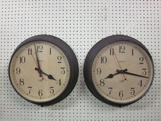 2 Magneta electric wall clocks with paper dials and Arabic  numerals 11"