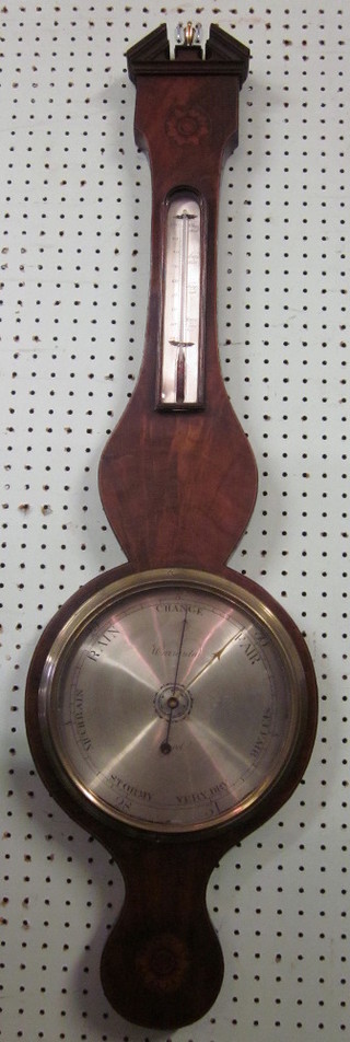 A 19th Century mercury wheel barometer and thermometer with silvered dial contained in a mahogany wheel case