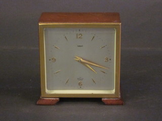 An Elliott Tarratt mantel clock with square silver dial and gilt numerals, contained in a walnut case 4"