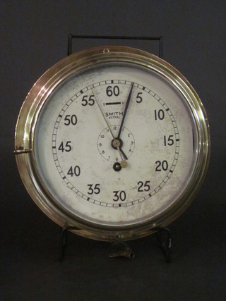 A Smiths Astral wardroom clock with 8" dial contained in a brass case