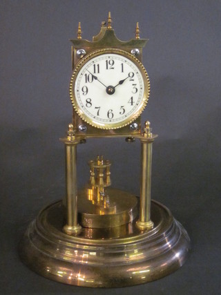 A 400 day clock with enamelled dial and Arabic numerals complete with glass dome  ILLUSTRATED