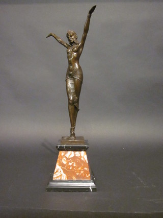 An Art Deco style bronze figure of a standing lady with  outstretched arms, raised on a marble base 22"