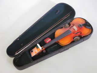 A violin with 2 piece back by Karl Bitterer, Geigenbaumeifter Mittenwold 1906, complete with bow and contained in a wooden  carrying case