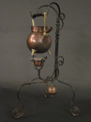 A Dresser style copper tea kettle the base with Orb mark, raised  on an iron stand complete with burner  ILLUSTRATED