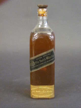 A bottle of Johnnie Walker Extra Special Black Label Old Scotts Whisky