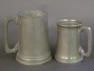A Victorian pewter pint tankard together with a Tudric Liberty &  Co pewter tankard, base marked 5030