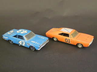 A Franklin Mint model of a 1967 Plymouth Belvedere together  with a model of The Dukes of Hazard General Lee