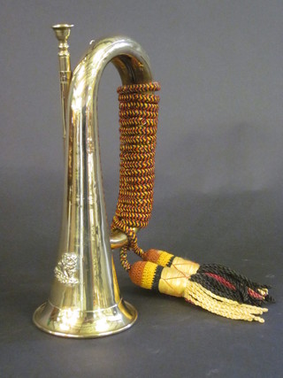 A reproduction brass bugle