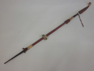An Eastern leather covered spear