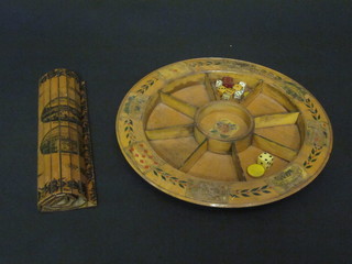 A circular segmented wooden dish, a tambour shutter decorated various scenes, 9 various dice