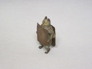 A bronze figure of a standing cat in the form of a sandwich board  man 2"