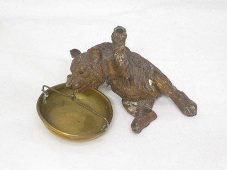 A spelter ashtray in the form of a seated bear, f, 4"