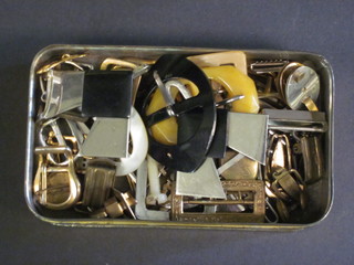 A small collection of buttons, buckles etc