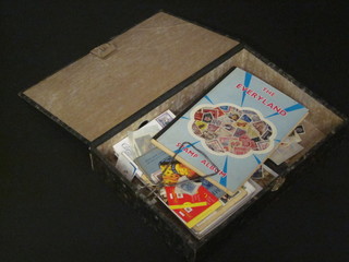 A box folder containing various stamps