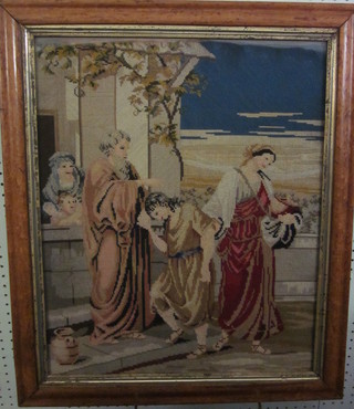 A Victorian Berlin woolwork panel depicting Christ Blessing  a Lady 21" x 17" contained in a maple frame
