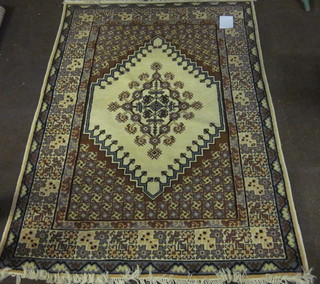 A white ground Eastern rug with diamond field to the centre  within multi-row borders 92" x 64"
