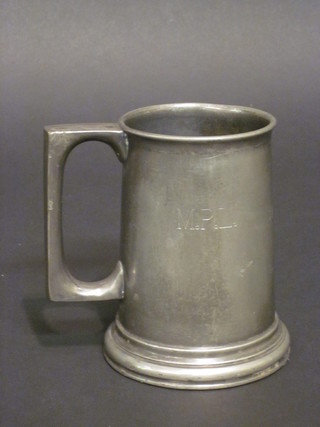 A pewter tankard with glass bottom marked Ivel Club