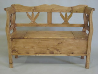 A stripped and polished pine settle 48"