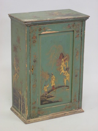 A 1930's green painted chinoiserie style cabinet enclosed by  a panelled door 16"