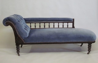 An Edwardian mahogany show frame chaise longue upholstered  in blue material 72"
