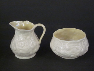 A Belleek jug, the base with green Belleek mark 3", chip to rim,  and a ditto bowl
