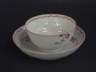 An 18th Century porcelain teabowl and saucer 4"