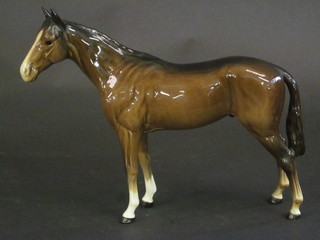 A Beswick figure of a standing bay stallion, 8 1/2"   ILLUSTRATED