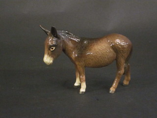A Beswick figure of a standing donkey 5"