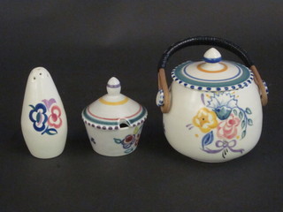 A circular Poole Pottery preserve jar and cover with floral  decoration, base impressed Poole England, 260 3", and a Poole  mustard pot and salt with dolphin mark