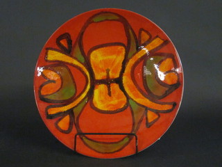 A Poole Pottery Atomic orange charger, cracked, base marked A  13"