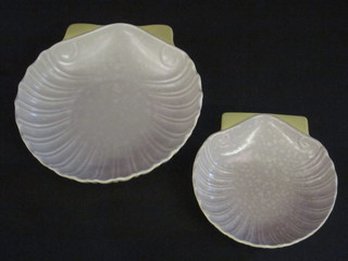 2 yellow and grey glazed Poole Pottery scallop shaped dishes,  with dolphin mark C108 9" and 6 1/2"