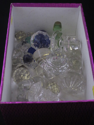 A collection of glass decanter stoppers