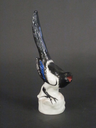 A Soviet Russian porcelain figure of a cock magpie 10"