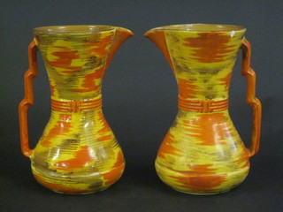 A pair of Wade Heath pottery jugs, bases marked 110 8 1/2", 1 with slight chip to rim,