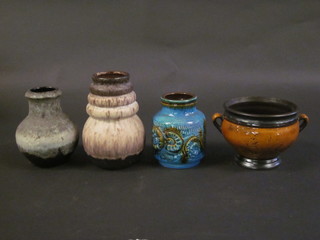A German blue glazed Art Pottery vase, base marked 7494.15  5", a brown glazed twin handled vase marked 93013 and 2 other  vases