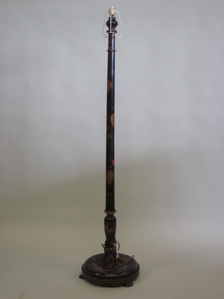 A 1930's black lacquered chinoiserie style standard lamp