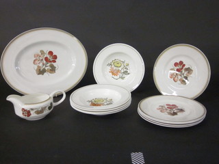 A 12 piece Susie Cooper Nasturtium pattern dinner service comprising oval meat plate 13", 5 side plates 8 1/2", 5 soup  bowls 8" and sauce boat