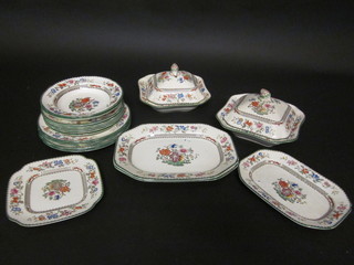 A 20 piece Copeland Chinese Rose pattern dinner service comprising 2 square vegetable tureens and covers 9", 2 lozenge  shaped meat plates 12 1/2", meat plate 10", square plate 8 1/2",  6 side plates 9 1/2", 6 dinner plates 10" - 2 cracked, soup bowl  9", 1 other bowl 9"