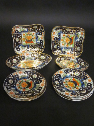 A 19th Century Derby style porcelain 10 piece fruit service comprising 2 8 1/2" boat dishes, a boat shaped dish 11", oval  dish 8", 6 plates 8" - 1 cracked