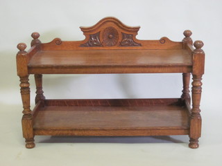 A rectangular Victorian honey oak 2 tier buffet, raised on turned  and block supports 41"