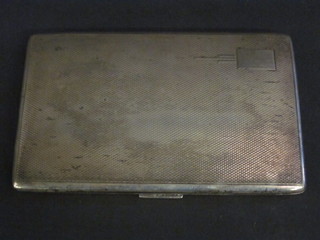 A silver cigarette case with engine turned decoration,  Birmingham 1949, 5 ozs