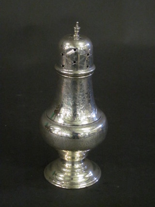 An engraved silver sugar castor, marks rubbed, 3 1/2 ozs