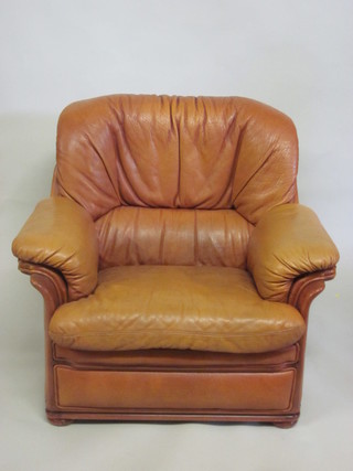 A leather and teak 3 piece suite comprising 2 seat settee and 2 matching armchairs