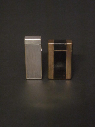 A Dupont gold plated lighter, together with a Dunhill silver  plated, f,