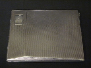 A silver cigarette case with engine turned decoration,  Birmingham 1937, 3 1/2 ozs