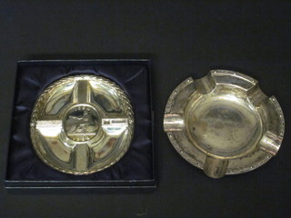 A silver ashtray and a silver ashtray to commemorate the 300th anniversary of the Bank of England, 3 1/2 ozs