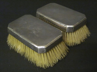 A pair of silver backed miniature hair brushes with engine turned decoration, Birmingham 1913,