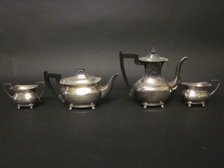 A 4 piece silver plated Georgian style tea service of oval form, comprising teapot, twin handled sugar bowl, hotwater jug and  cream jug,